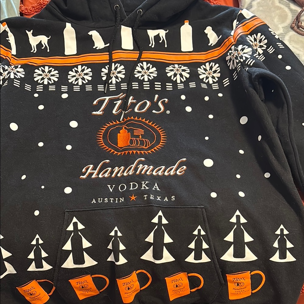 Cozy Black and Orange Sweater with Geometric Patterns